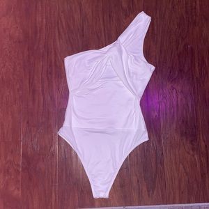small white across the shoulder bodysuit